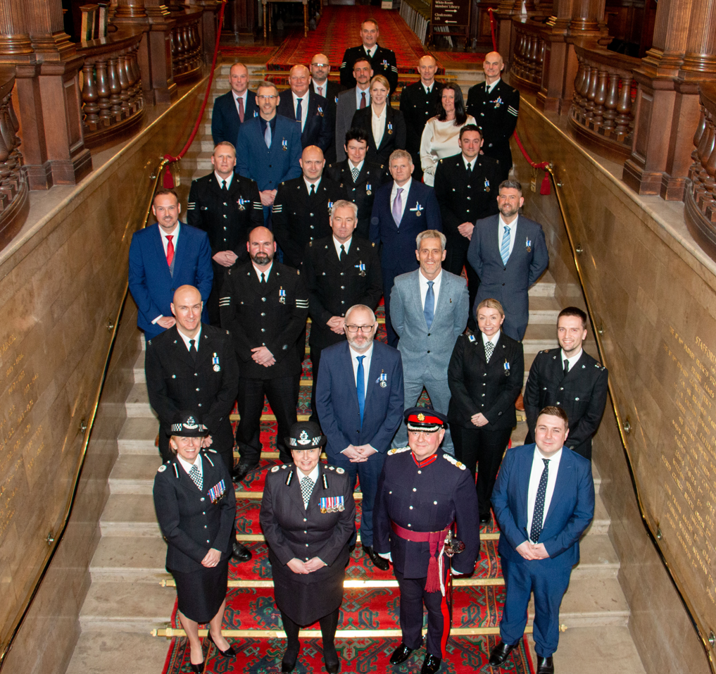 Group picture of attendees at the Council Chambers building in Stafford