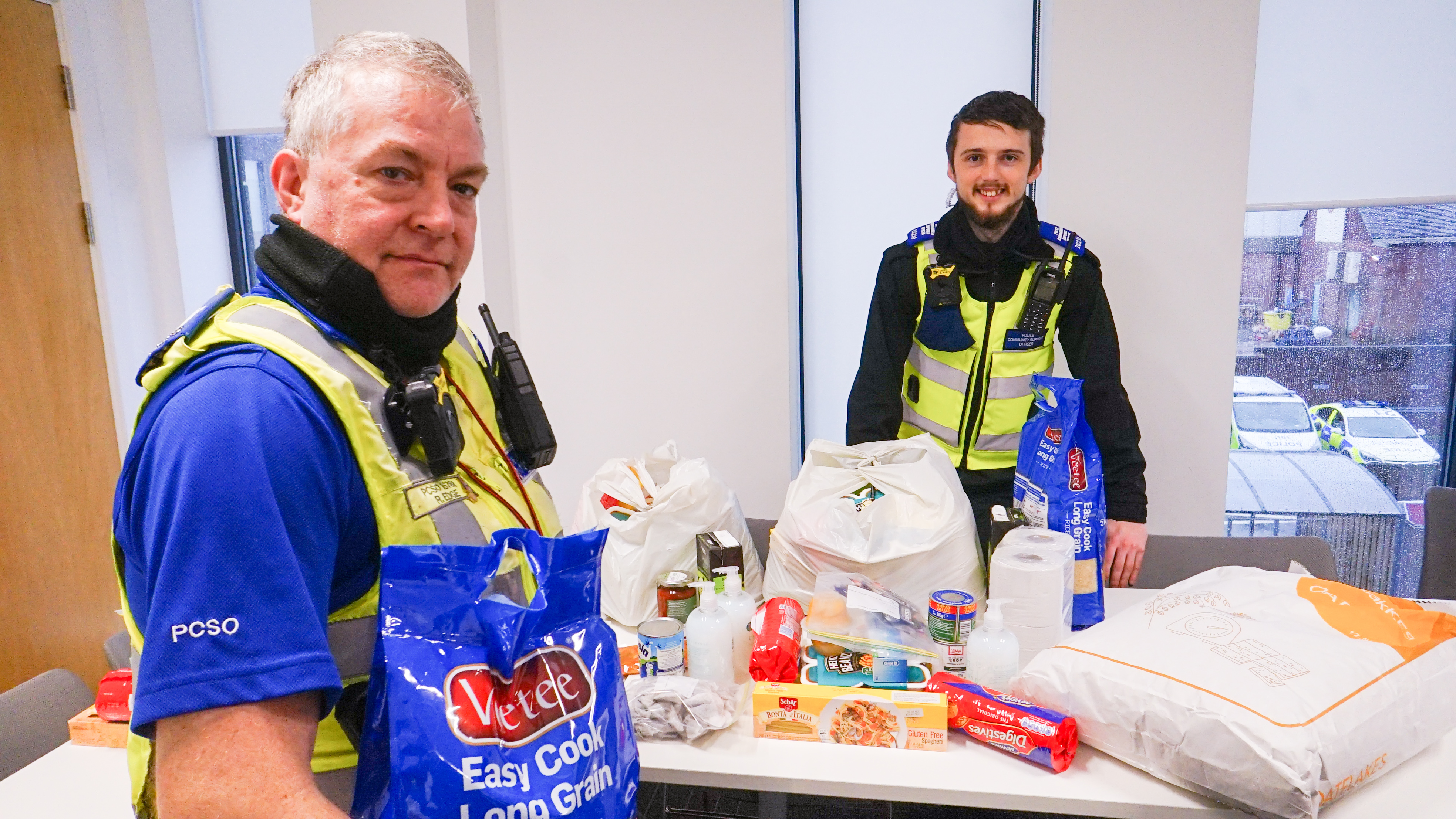 PCSO Rob Edge and PCSO Luke Verrall with some of the food