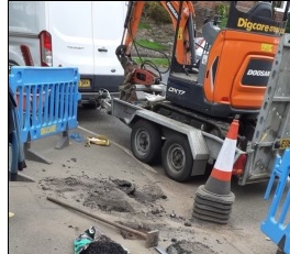 Stolen digger on trailer 