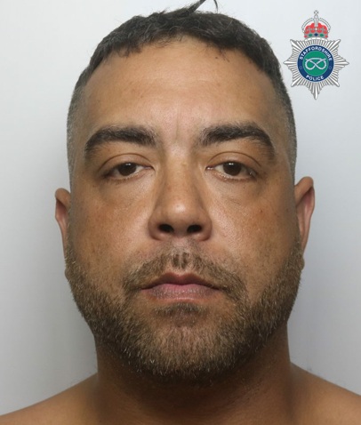 ROMAIN custody image.